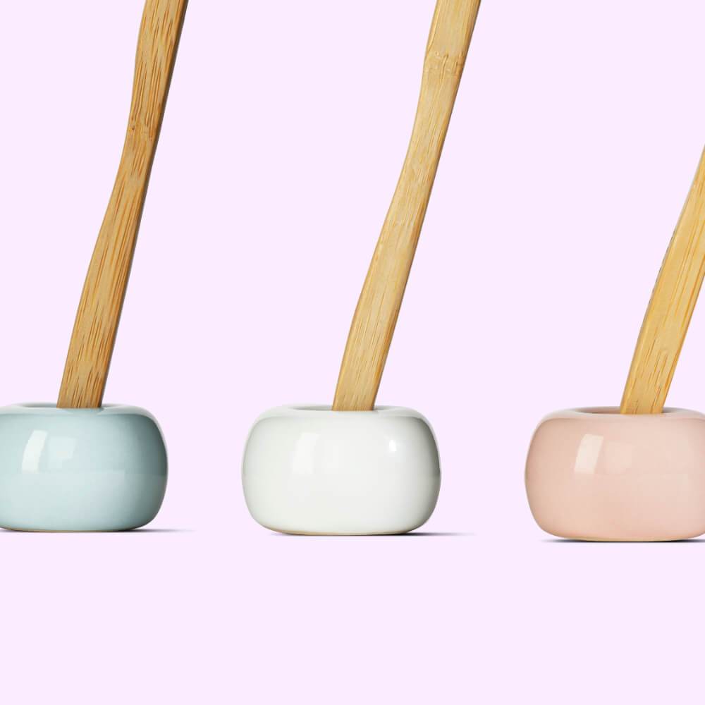 “Keep ‘em Dry” Toothbrush Stands